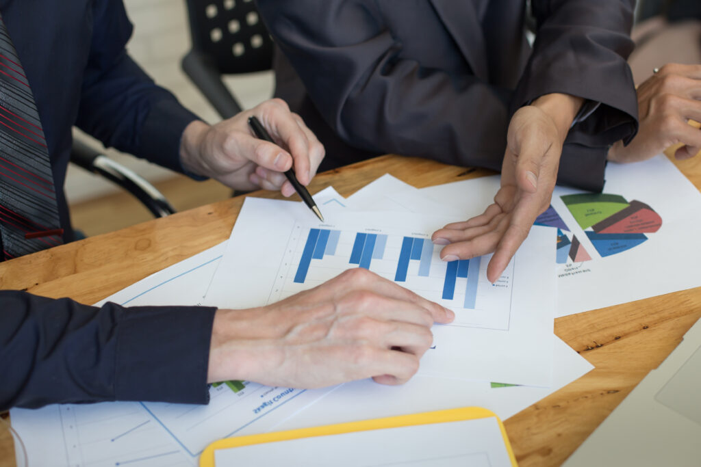 business people discussing charts graphs showing results their successful teamwork
